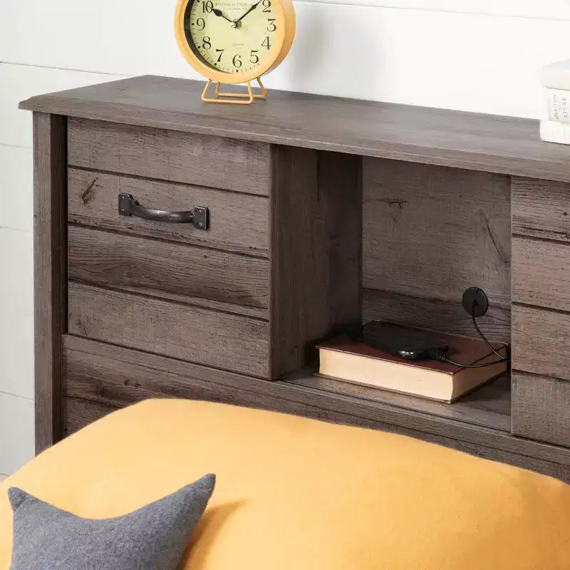 Tête de lit bibliothèque avec rangements et portes coulissantes pour chambre d'enfant
